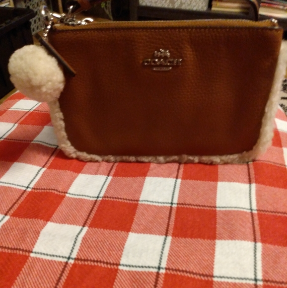EUC COACH Nolita Shearling Leather Wristlet  Brown Pebbled - Picture 1 of 6